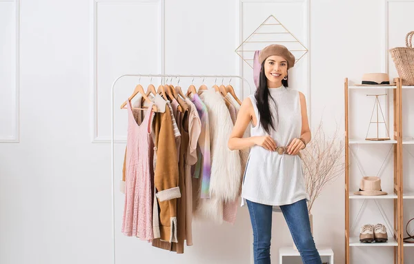 Young female clothes stylist at workplace — Stock Photo, Image