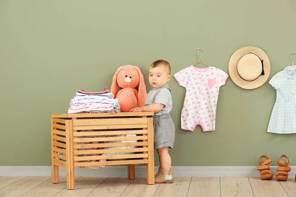 Cute baby with stylish clothes and toy at home — Stock Photo, Image