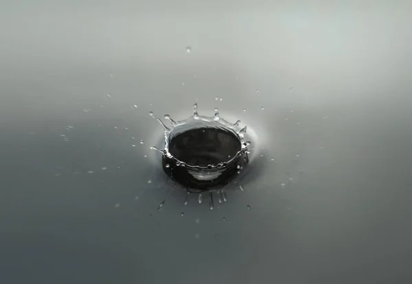 Splash of clean water on dark background — 스톡 사진