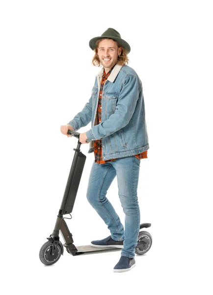 Young man with kick scooter on white background — Stock Photo, Image