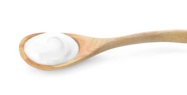 Łyżka z smacznym jogurtem na białym tle — Zdjęcie stockowe