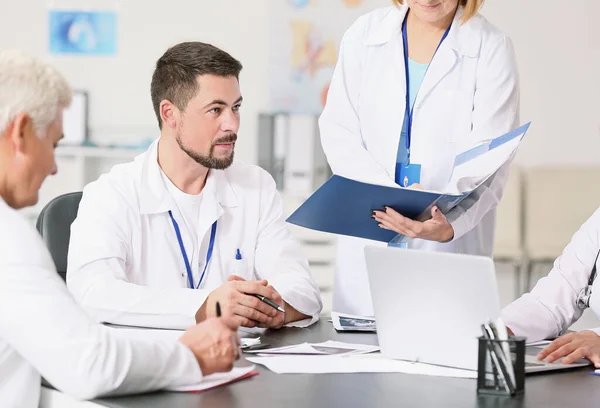 Team of doctors during meeting in clinic — Stock Photo, Image