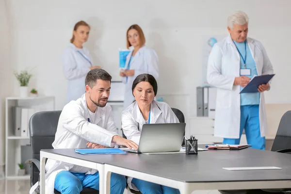 Team of doctors during meeting in clinic — Stock Photo, Image