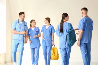 Group of medical students in hall of clinic