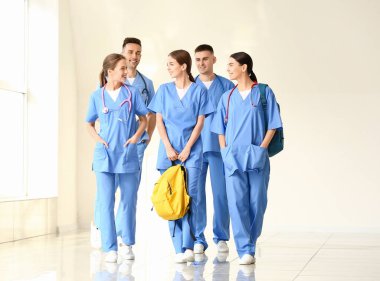 Group of medical students in hall of clinic