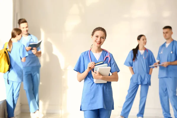 Female medical student in hall of clinic — Stock Photo, Image