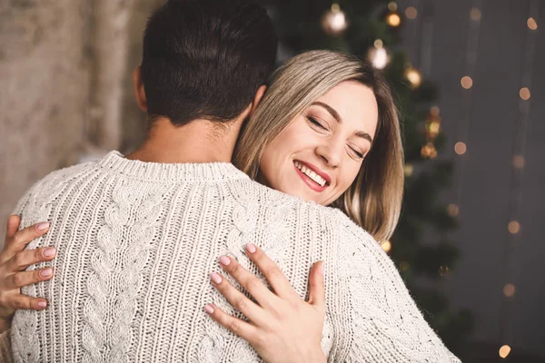 Happy couple on Christmas eve at home — Stock Photo, Image