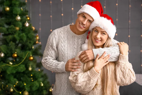 Happy couple on Christmas eve at home — Stock Photo, Image