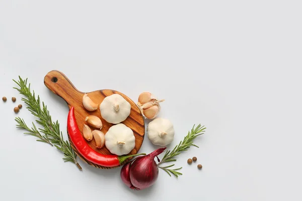Garlic, spices and herbs on white background — Stock Photo, Image