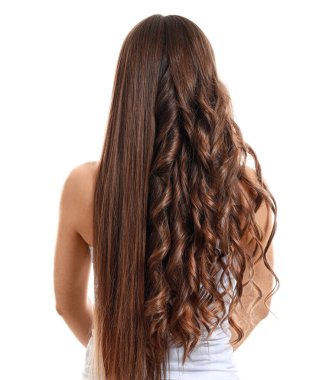 Beautiful woman with curly and smooth hair on white background, back view