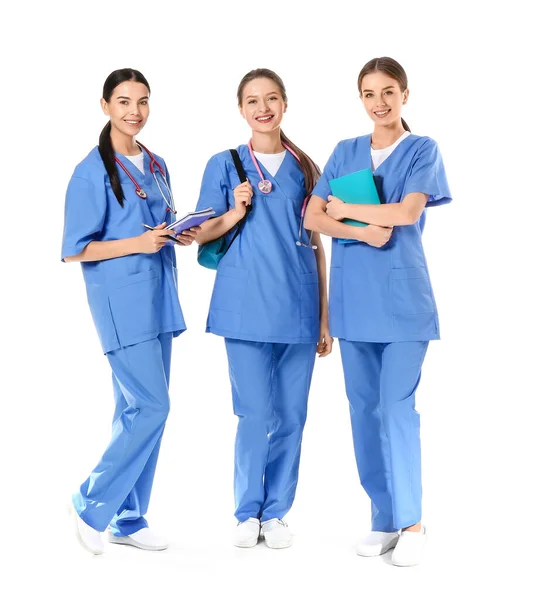 Female medical students on white background — 스톡 사진