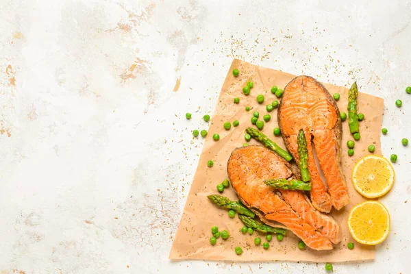 Composition with fried salmon on table — Stock Photo, Image