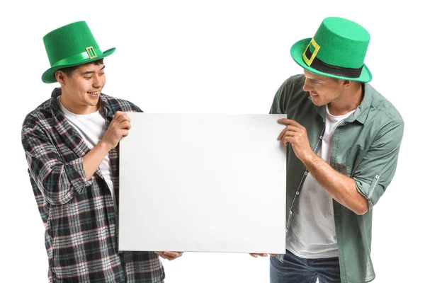 Young men with blank poster on white background. St. Patrick's Day celebration — Stok fotoğraf