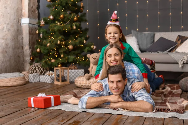 Happy family on Christmas eve at home — Stock Photo, Image