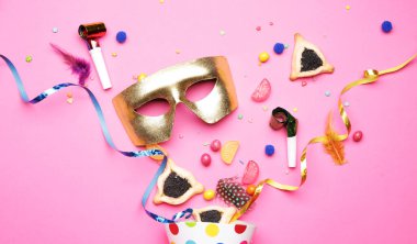 Composition for Purim holiday on color background