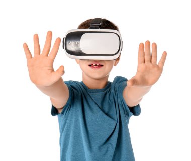 Little boy with virtual reality glasses on white background