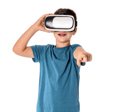 Little boy with virtual reality glasses on white background