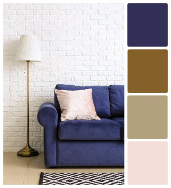 Interior of room with modern sofa. Different color patterns
