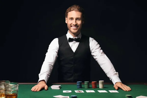 Young male banker at table in casino — Stock Photo, Image