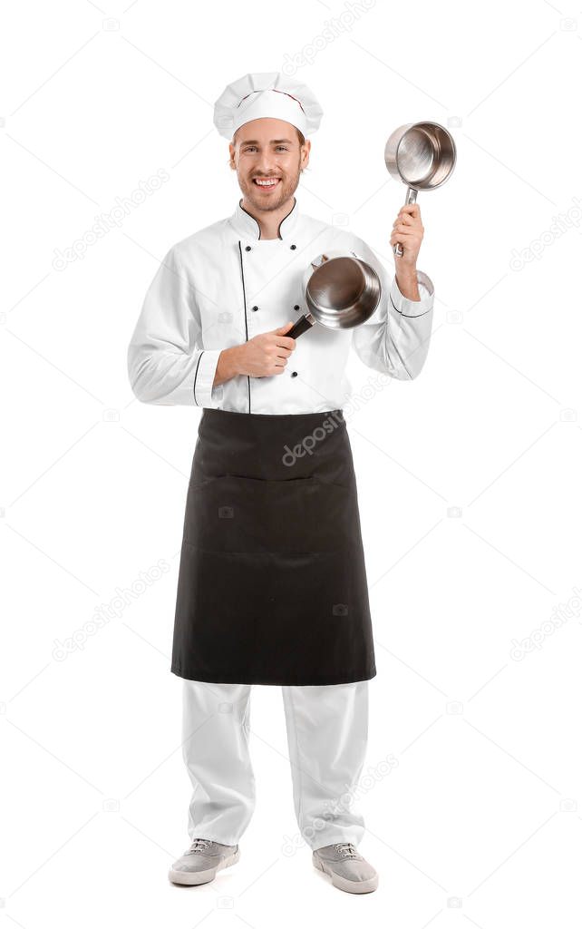Handsome male chef with saucepans on white background