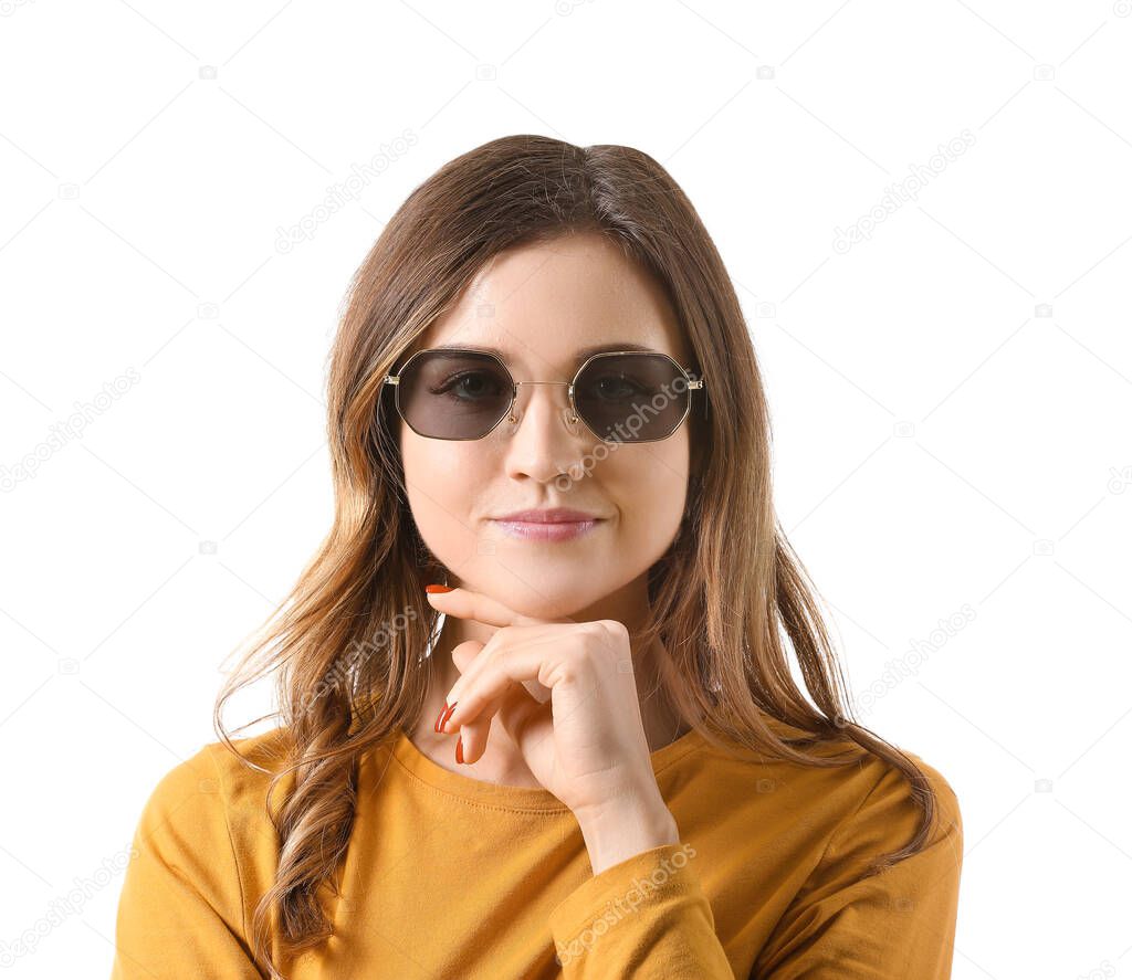 Young woman with stylish sunglasses on white background