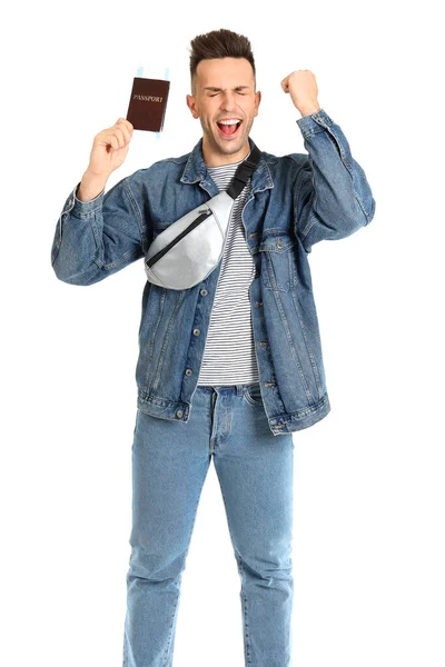 Happy male tourist with passport and tickets on white background — Stock Photo, Image