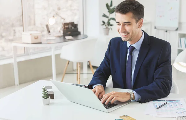 Male bank manager working in office