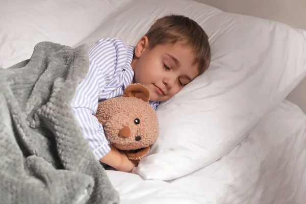 Cute little boy sleeping in bed — Stock Photo, Image