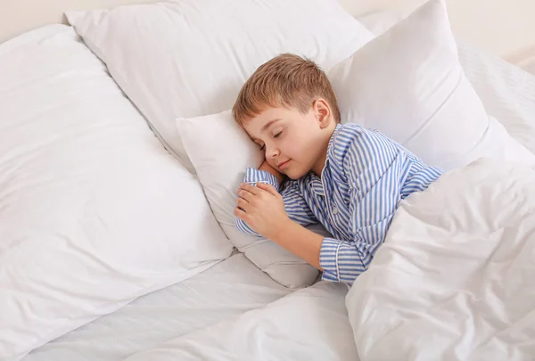 Cute little boy sleeping in bed — Stock Photo, Image