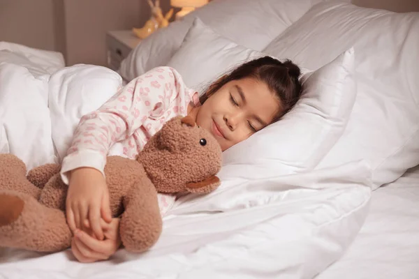 Cute little Asian girl sleeping in bed — Stock Photo, Image