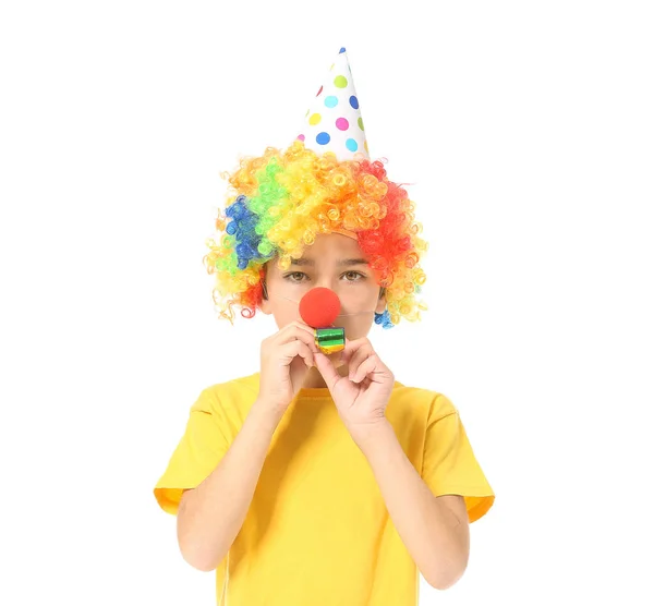 Little boy in funny disguise and with party whistle on white background. April fools' day celebration — Stock Photo, Image