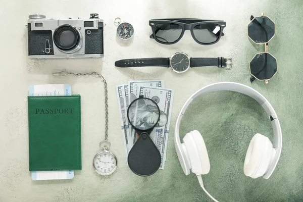 Set of travel accessories on color background — Stock Photo, Image