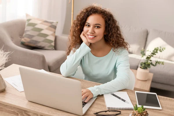 Young African-American businesswoman working at home — Stock Photo, Image