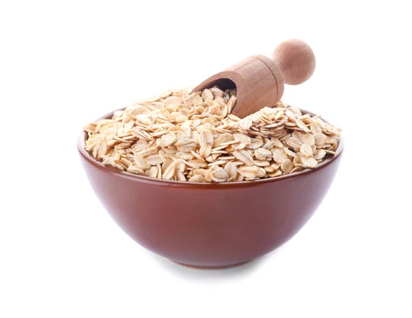 Bowl of raw oatmeal on white background — Stock Photo, Image