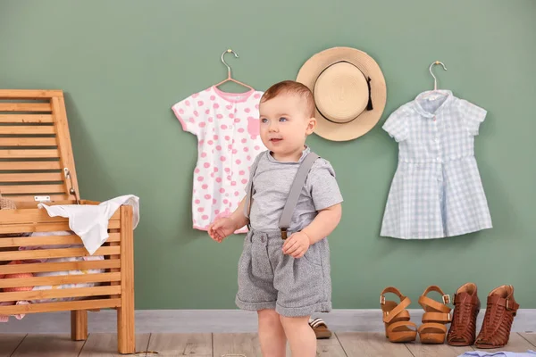 Cute baby with stylish clothes at home — Stock Photo, Image