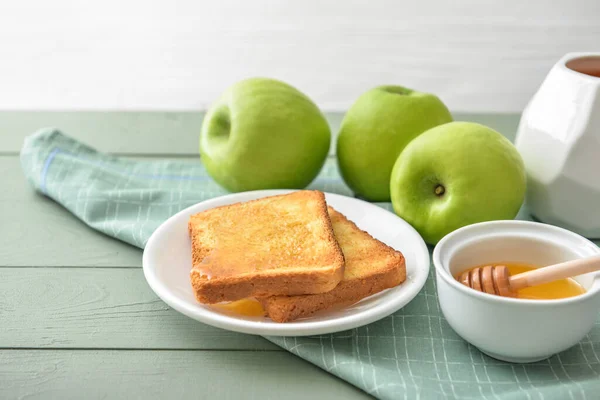 Sweet honey, apples and toasted bread on table — Stock Photo, Image