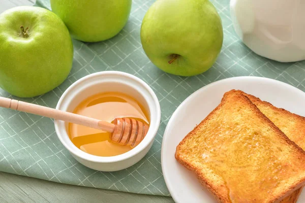 Sweet honey, apples and toasted bread on table — 스톡 사진