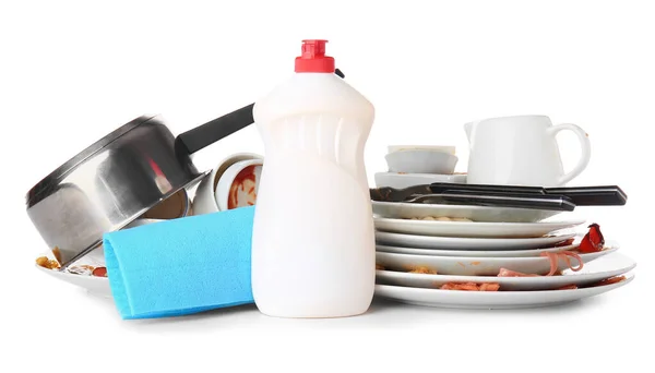 Dirty empty dishes with detergent on white background — Stock Photo, Image