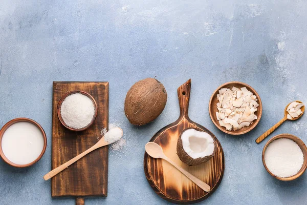 Composition with different coconut products on color background — Stock Photo, Image