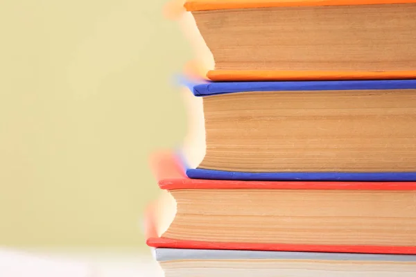 Many books on color background, closeup — Stock Photo, Image