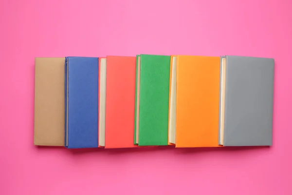 Many books on color background — Stock Photo, Image