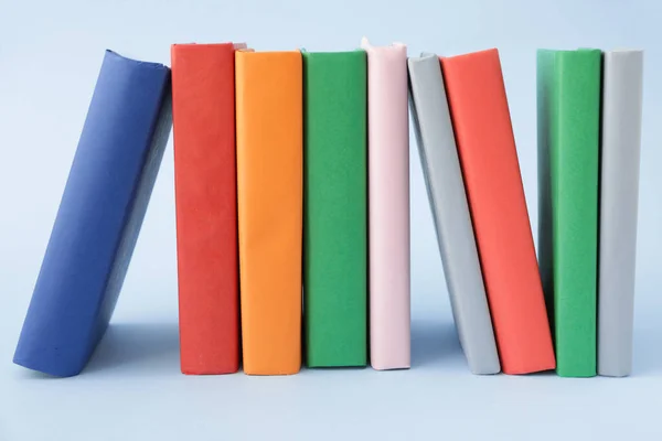 Many books on color background — Stock Photo, Image