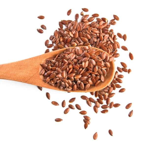 Spoon with flax seeds on white background — Stock Photo, Image