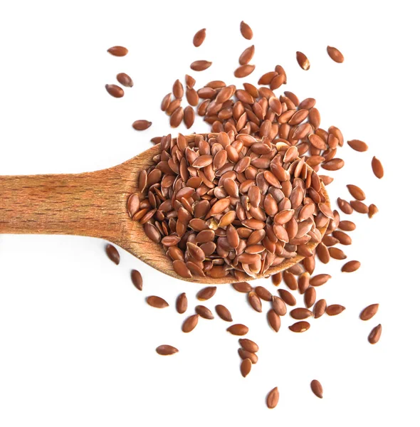 Spoon with flax seeds on white background — Stock Photo, Image