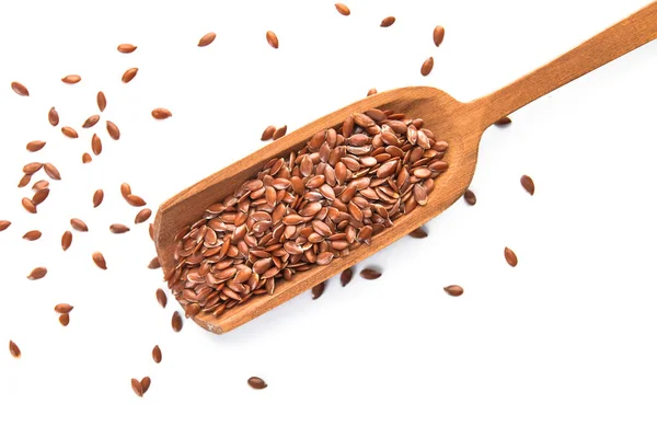 Scoop with flax seeds on white background — Stock Photo, Image