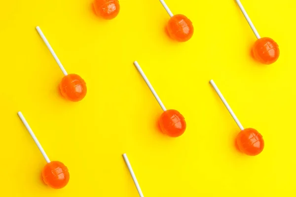 Tasty lollipops on color background — Stock Photo, Image