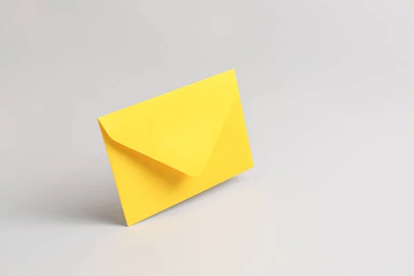 Paper envelope on grey background — 스톡 사진