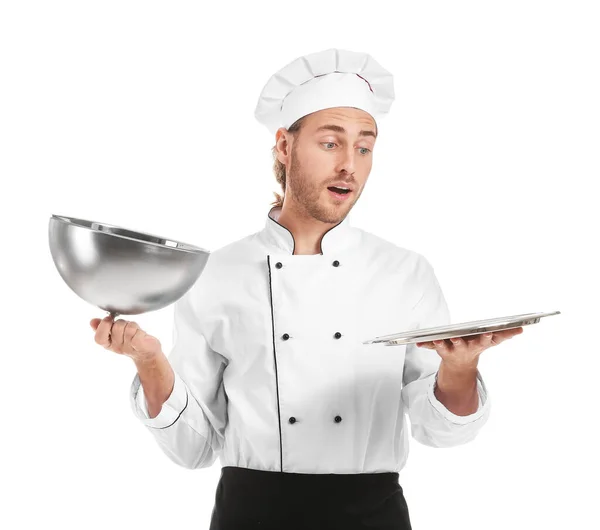 Shocked male chef with tray and cloche on white background — Stock Photo, Image