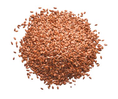 Beyaz arkaplanda keten tohumu yığını