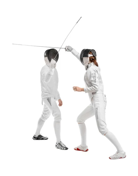Young fencers on white background — Stock Photo, Image
